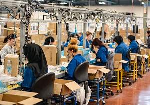 Photo of people working in a production line