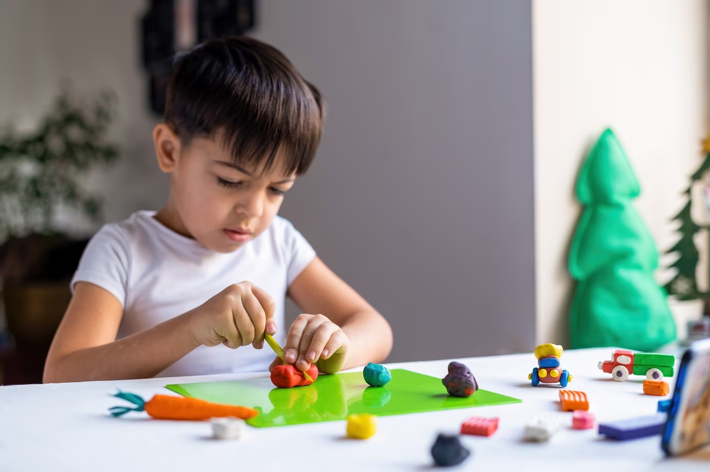 A little kid mastering creativity