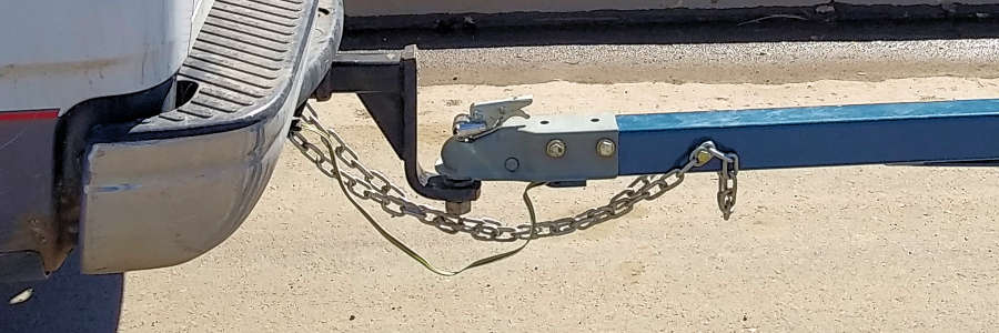 When One Vehicle is Towing Another by Means of a Chain: Safety Precautions and Tips