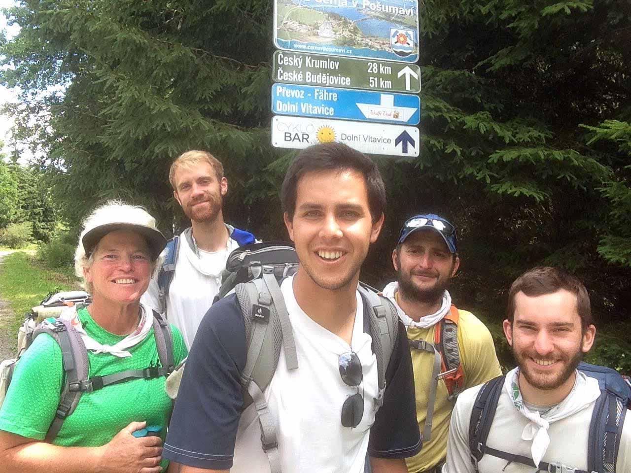 Taking a break on a road in Czech Republic, a group making a walking pilgrimage from Rome to Krakow, Poland, in time for World Youth Day includes (from left) Ann Sieben, Nick Zimmerman, Rafael Maturo, Ricardo Simmonds and Andrew Dierkes.