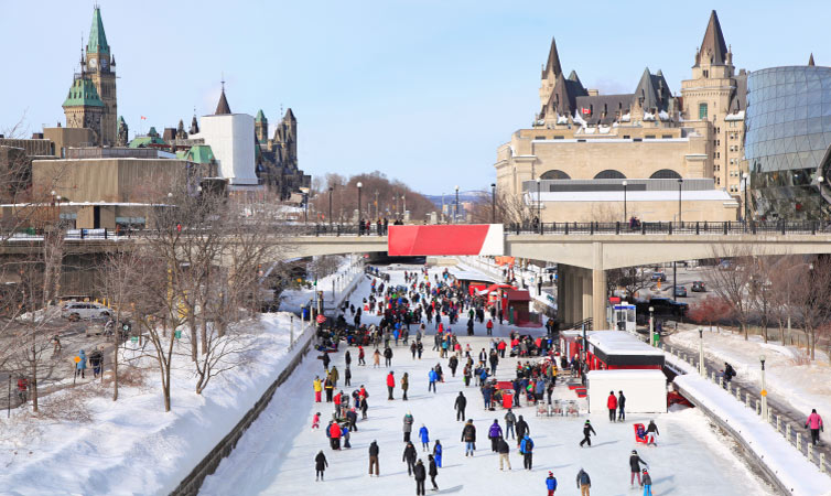 People ice skating at the Rideau Canal Ice Skating Rink in winter