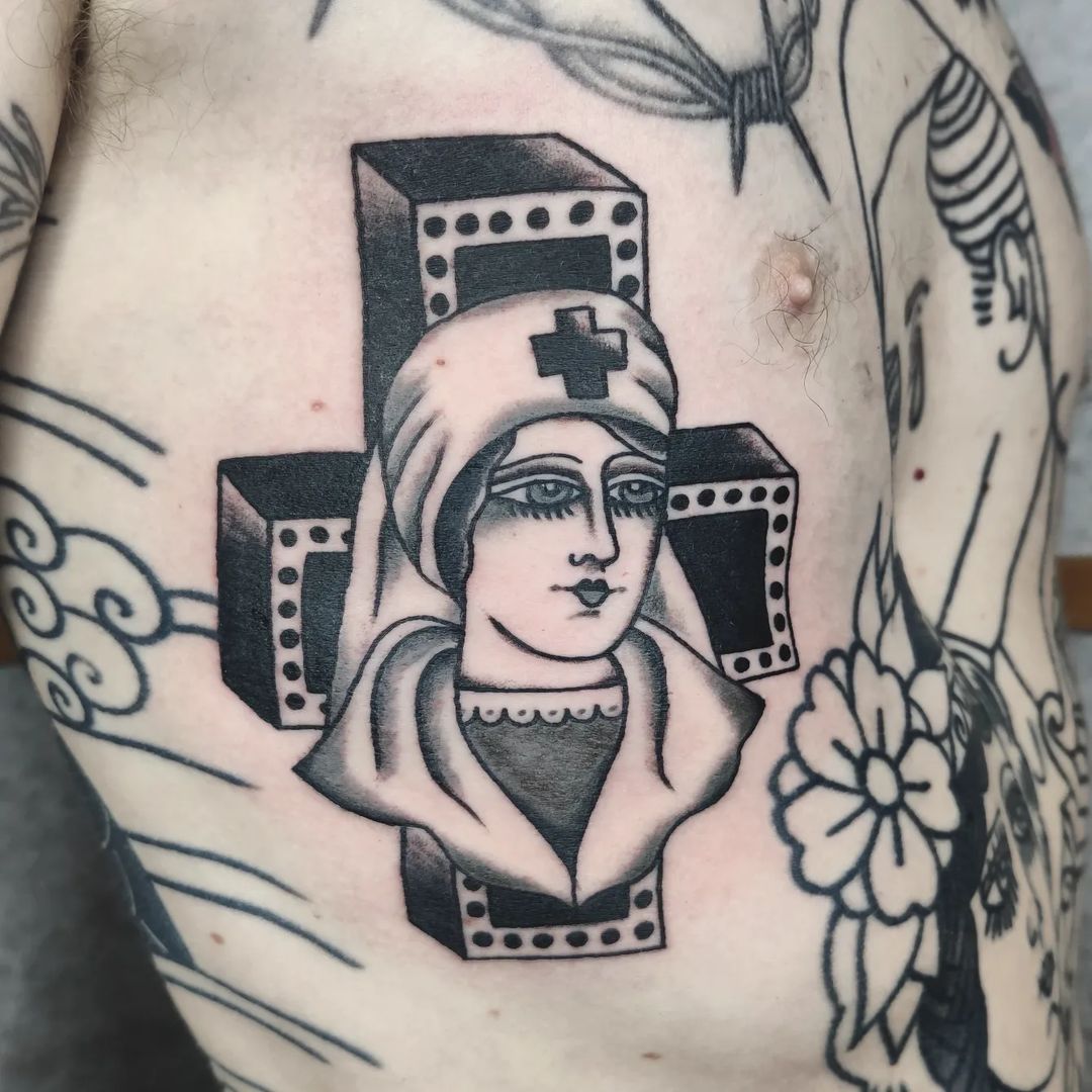 Nurse with Cross Tattoo