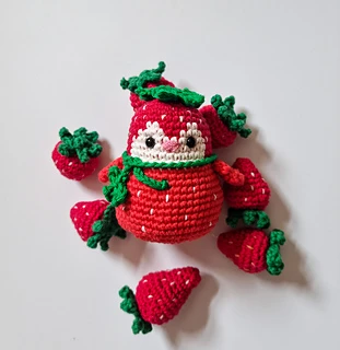 strawberry penguin with crochet strawberries