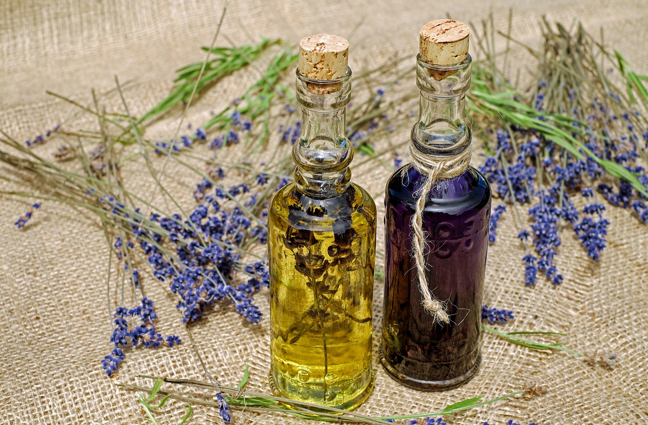 Lavender Essential Oil: lavender flowers and bottles