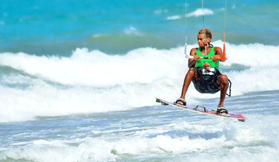 man kite surfing on kite beach in cabarete