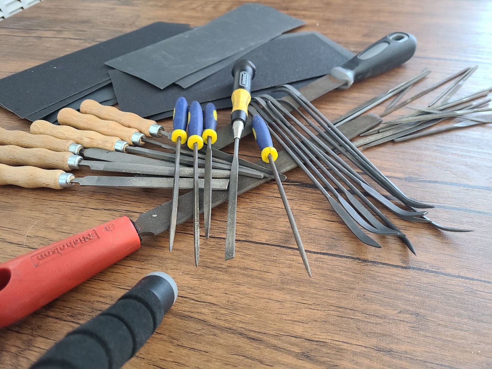 tools for silversmithing include files and abrasives