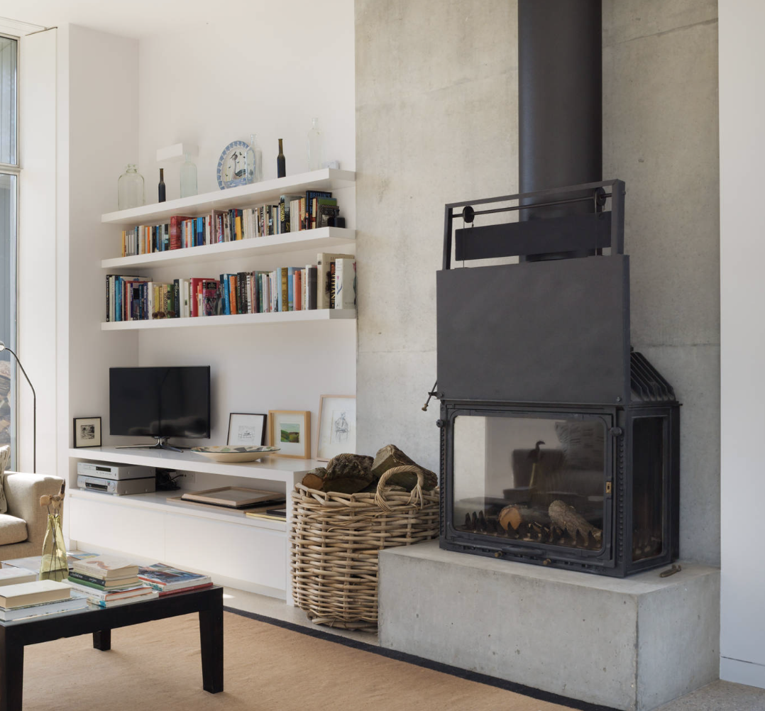 Simple Concrete Chimney Breast With Wood Fire burner