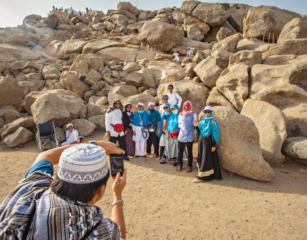 Muslim Hajj Pilgrims at Mt Arafat taking a picture