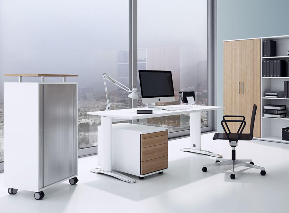 A movable office desk and chair offering adaptability.