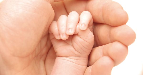 baby opening and closing hands