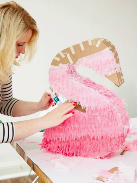 How To Host One Epic Galentine’s Day Brunch - Pink Ombre Swan Pinata