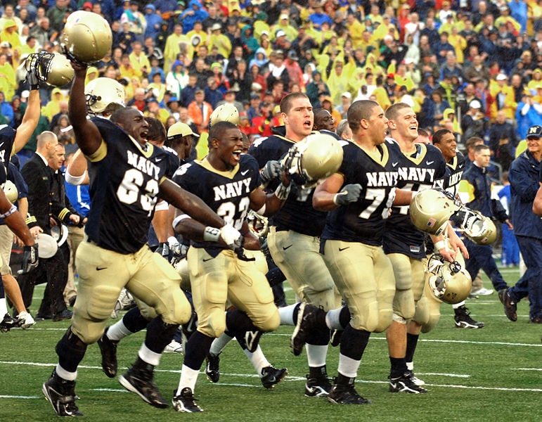 us_navy_051008-n-9693m-022_members_of_the_u-s-_naval_academy_football_team_run_across_the_field_toward_the_home_team_stands_in_celebration_of_their_victory_over_air_force_27-24_at_navy-m.jpg