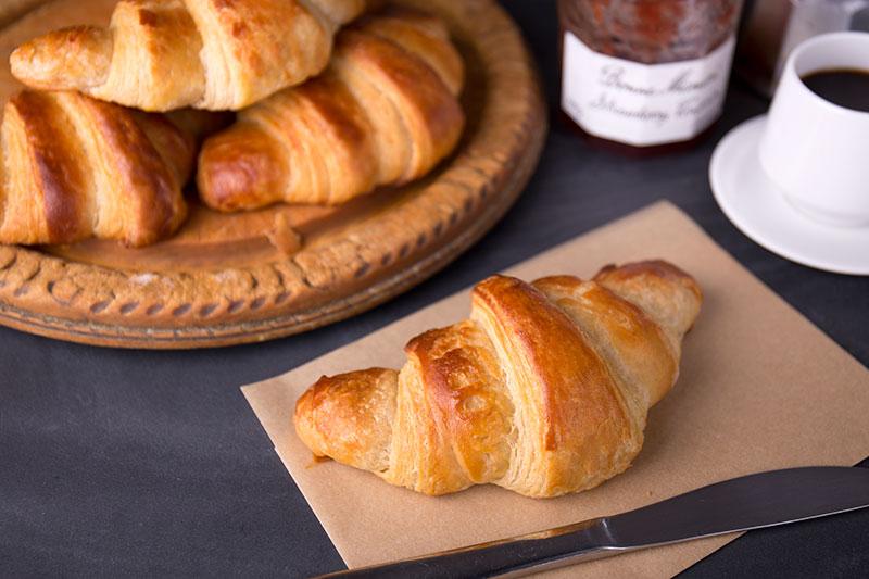 Make perfect patisserie treats at home with this recipe for all butter french croissant using spelt flour instead of wheat. These flaky, baked, enriched dough treats are a labour of love and use fresh yeast, milk, sugar, wholemeal spelt and white spelt flour.