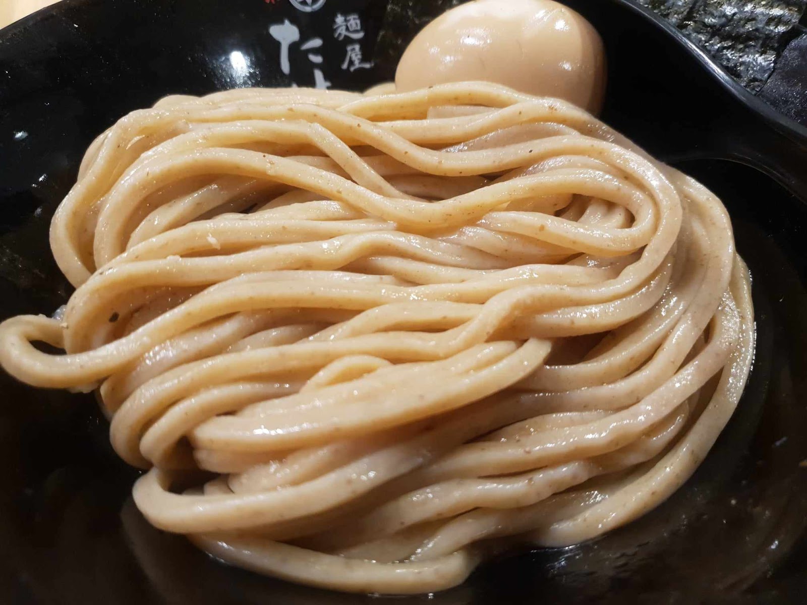 silky tsukemen noodles and soft boiled egg at Men-ya Takei Hankyu Umeda