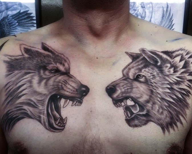 Two Matching Wolf Tattoo