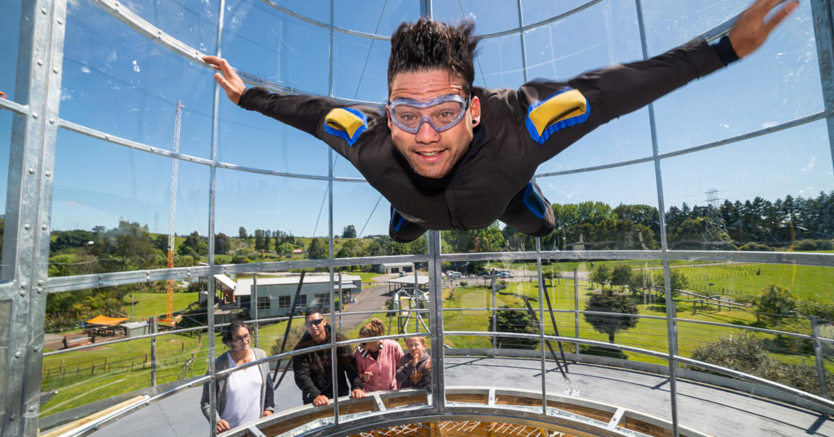Man flying in zero gravity fan at Valocity Valley, Rotorua