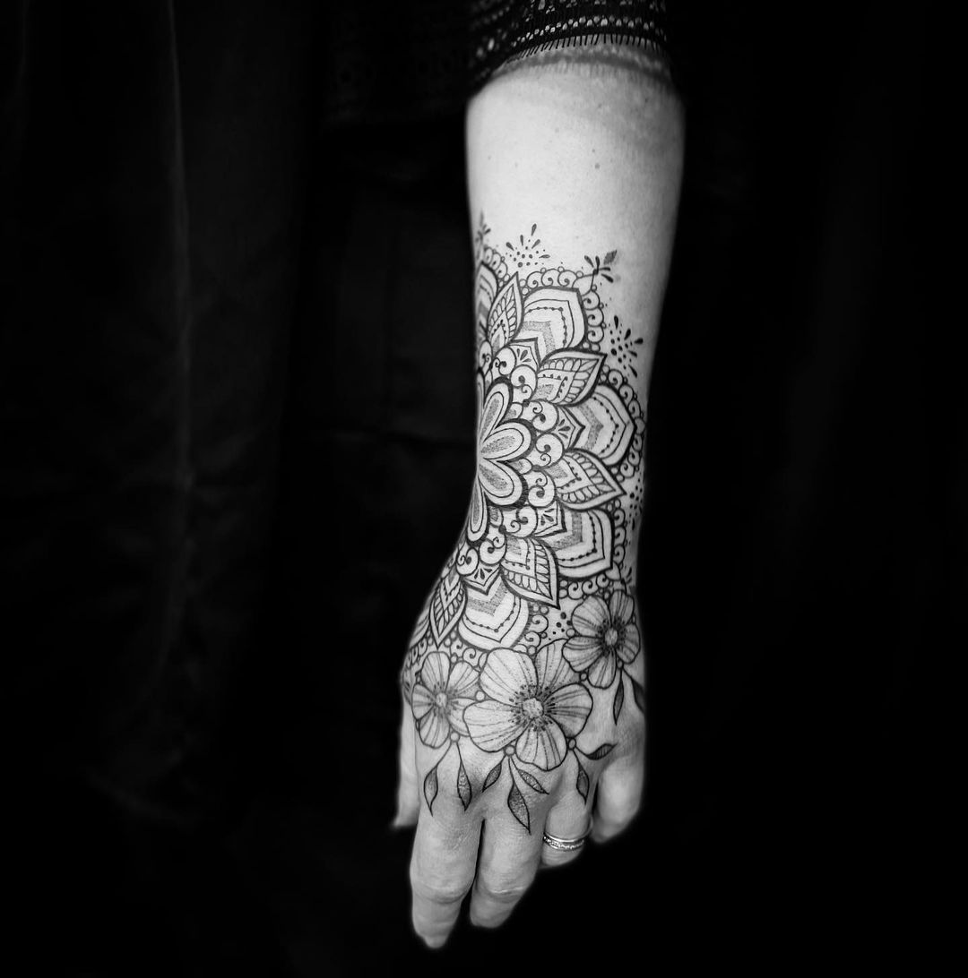 flower mandala tattoos on wrist