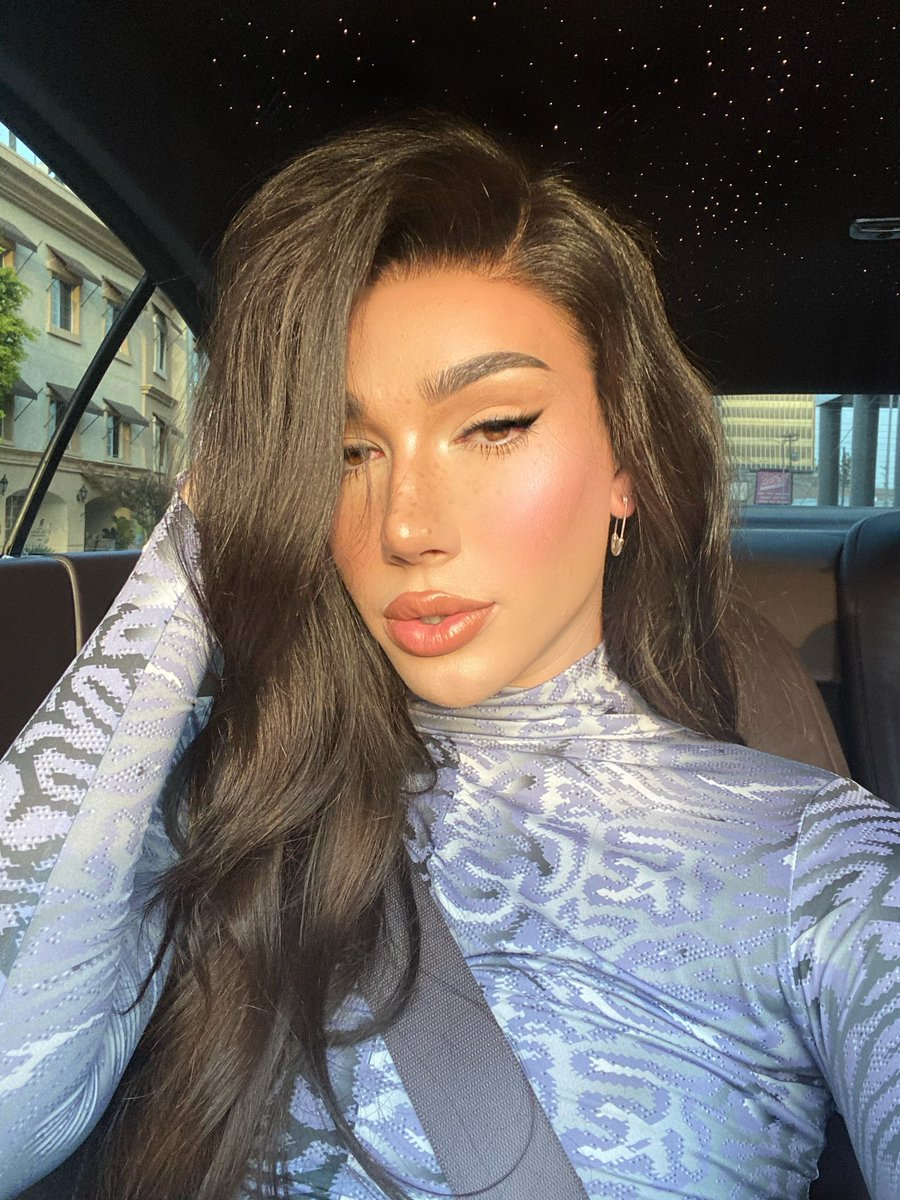 James Charles with a wig