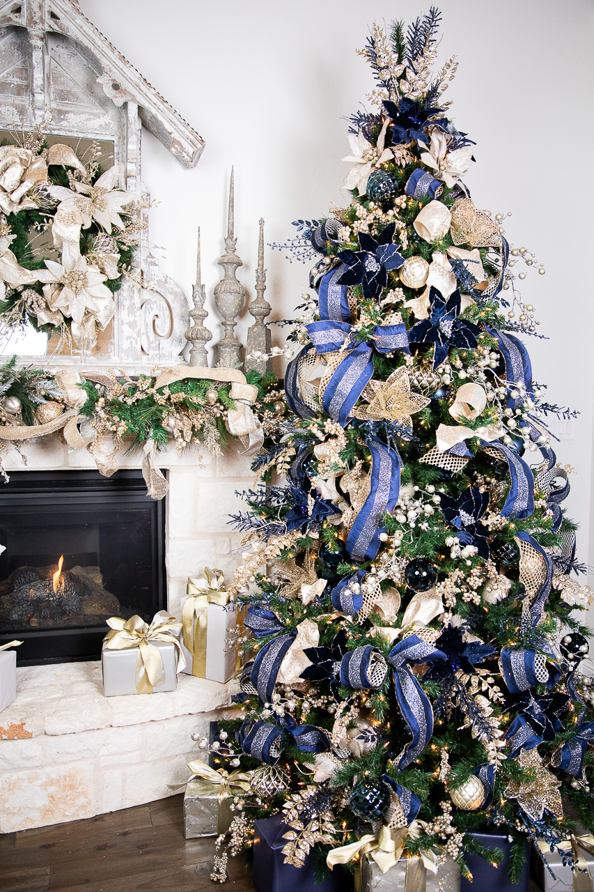 Full length navy, gold, and silver Christmas tree