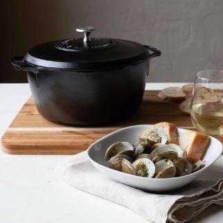 Black Lodge Dutch oven on a cutting board. 