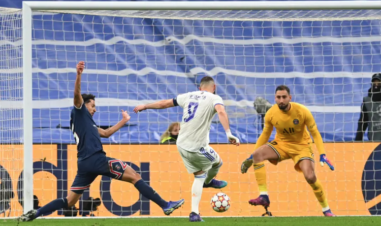 Karim Benzema scores Real Madrid’s first goal after robbing a dawdling Gianluigi Donnarumma