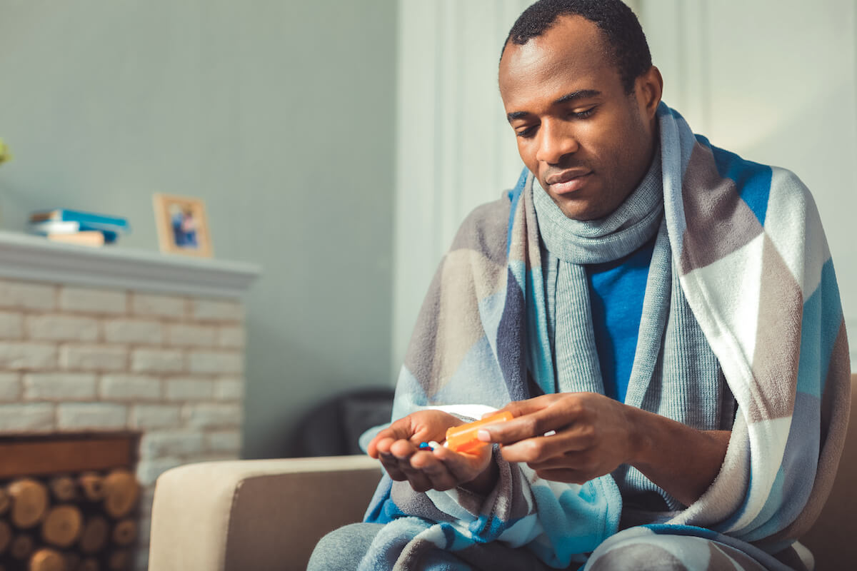 Man taking his pills