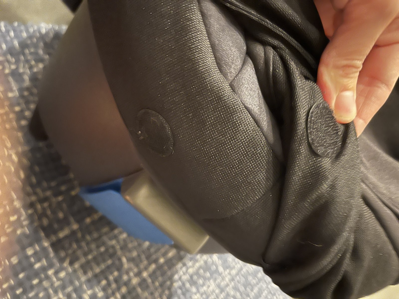 Pull out plastic tucked under the bottom of the nuna pipa car seat continued