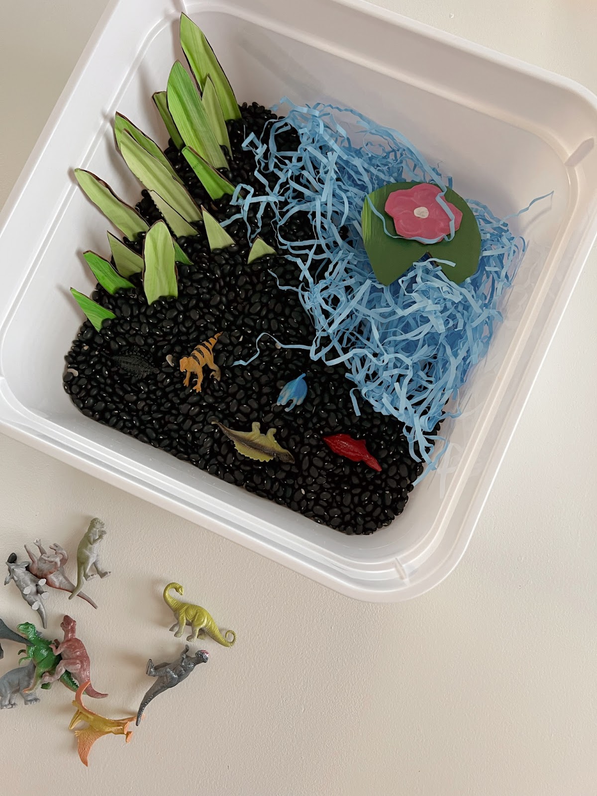 spring dinos spring sensory bin 