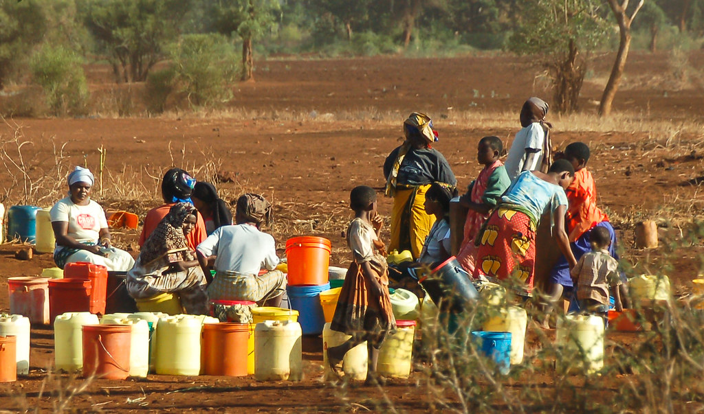 Getting water | Group of people waiting for water. Tanzania … | Flickr