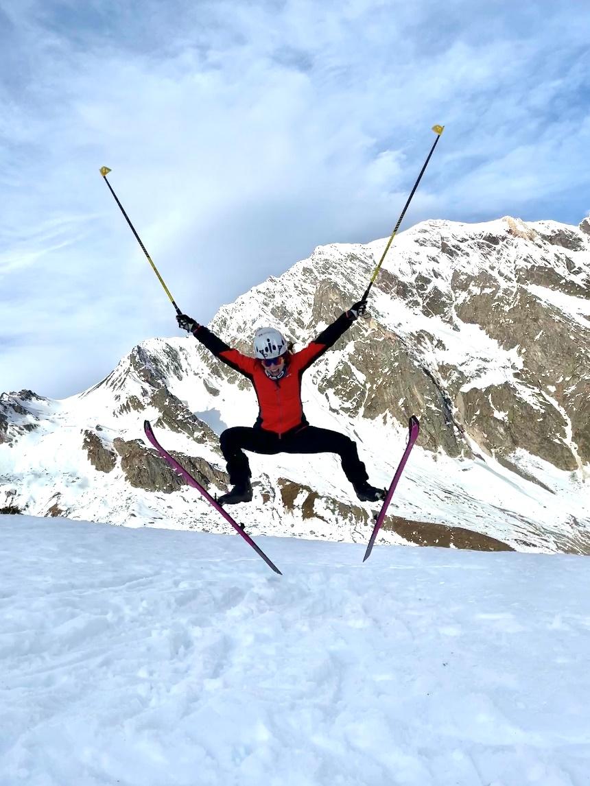 A person jumping in the air on skis

Description automatically generated with low confidence