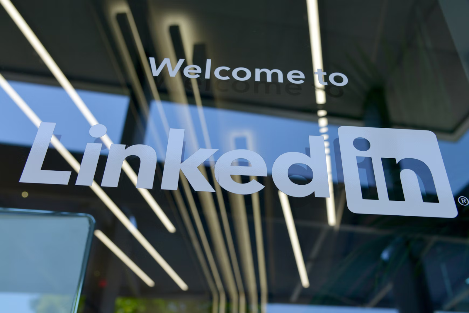 Social media website LinkedIn logo displayed on a door at the corporate office