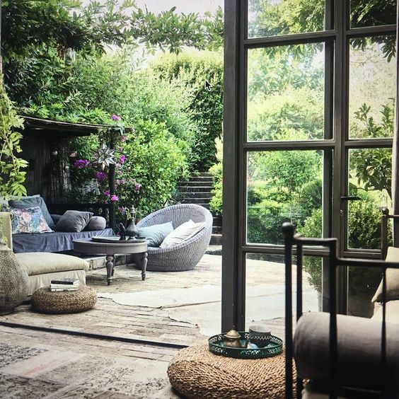 outdoor seating, blue grey sofa and wicker chair in atlanta