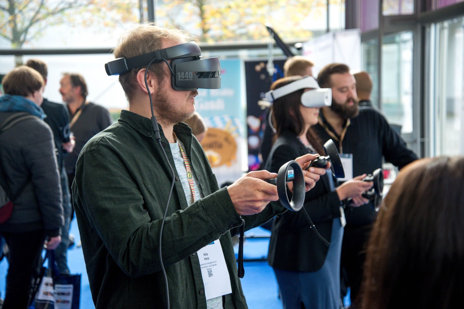 Image of people wearing Virtual And Augmented Reality headsets