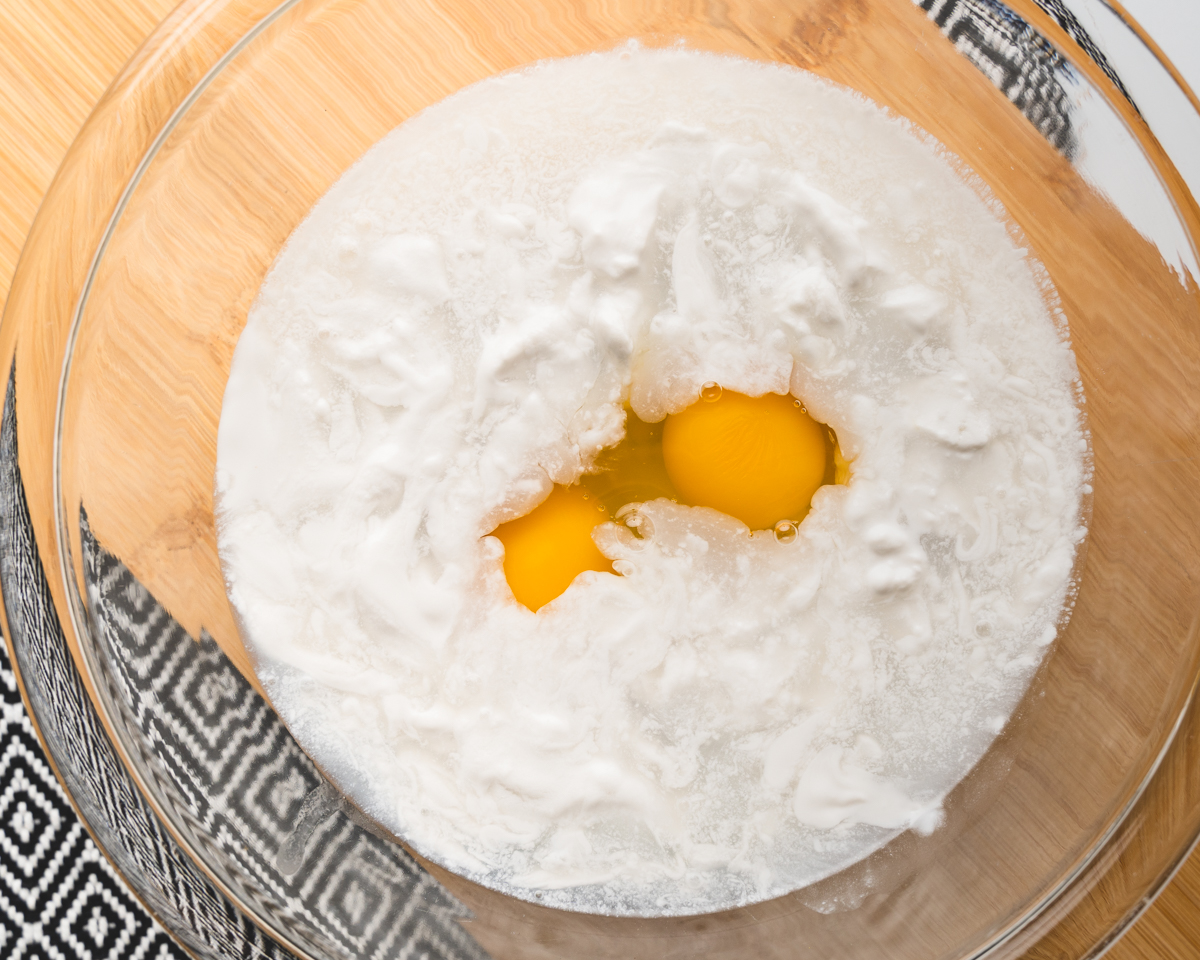 wet ingredients for mochi muffins mixed in a bowl