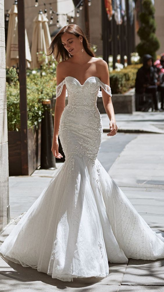 Woman wearing mermaid corset wedding dress