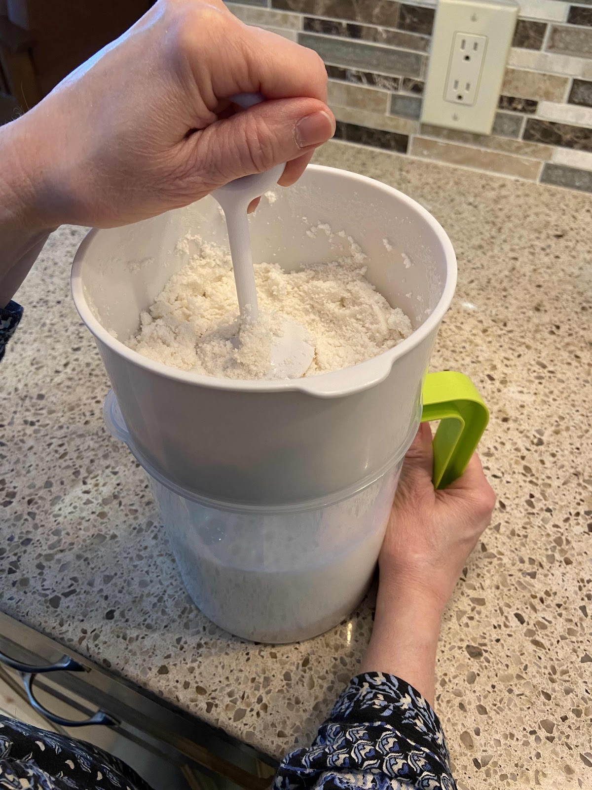 Straining the nut solids from the milk