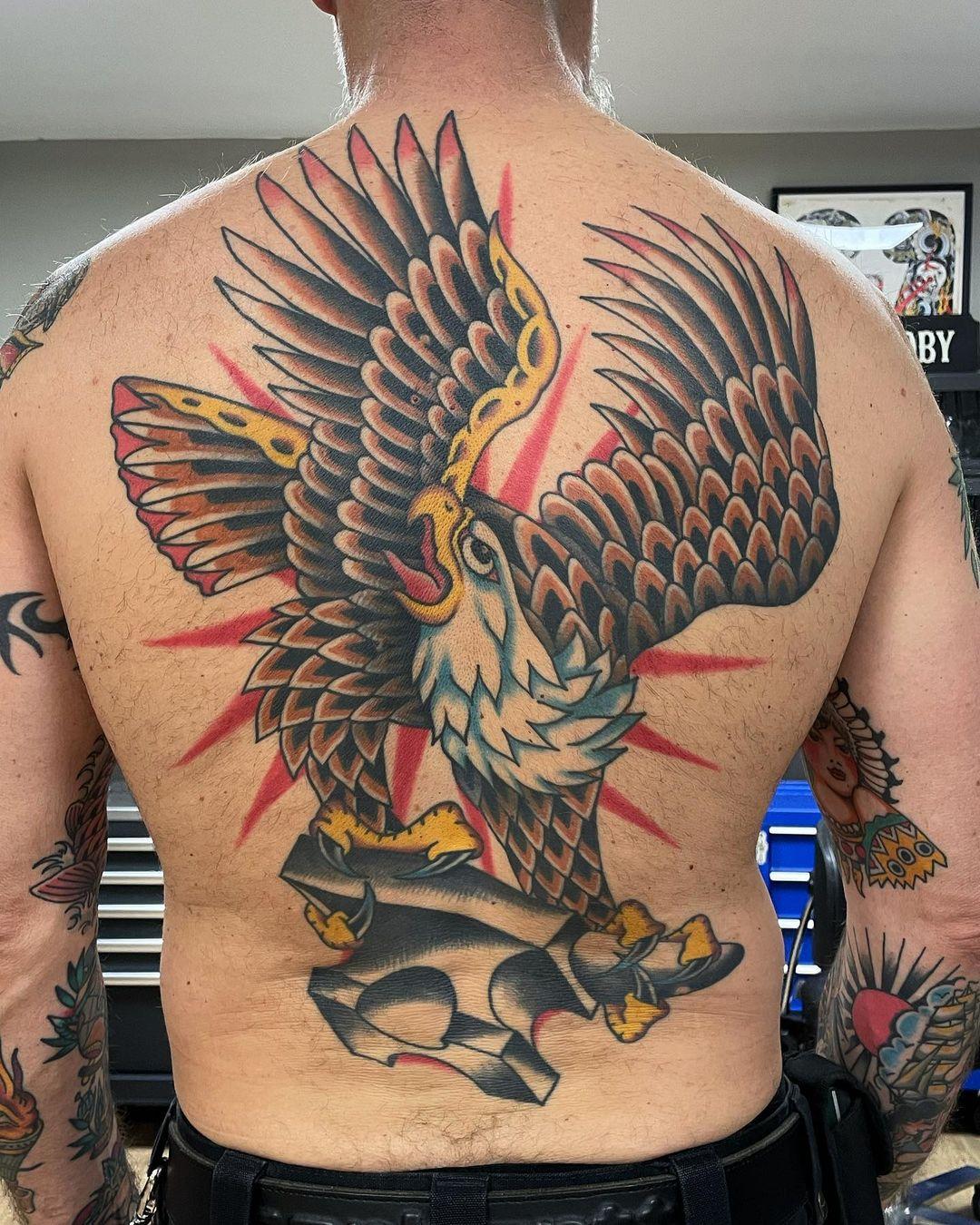 Amazing Eagle With Weight Tattoo On Back