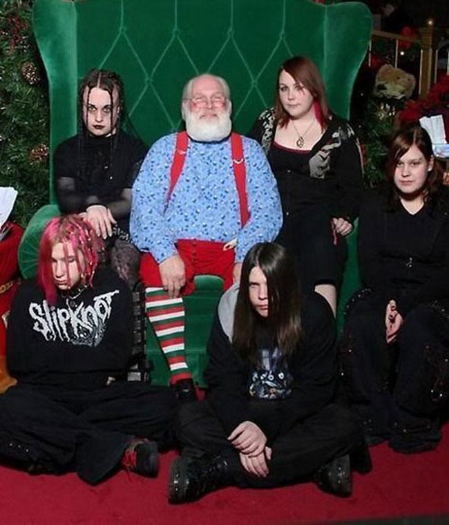 Five teens posing with Santa. Would you depict what is happening in this photo as normal? What is going on that you would or would not depict as normal?