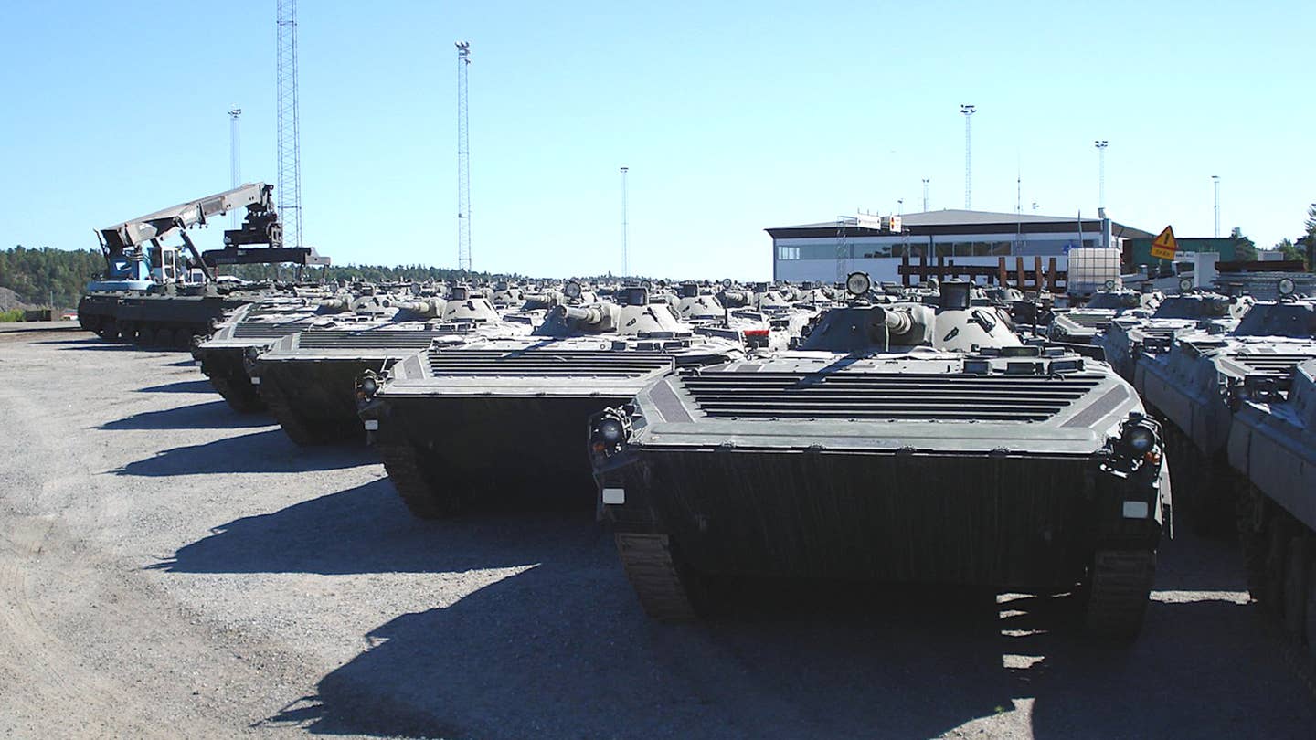 A row of Swedish Pbv-501 infantry fighting vehicles, which are modified BMP-1s. The Czech Republic is set to transfer 56 Pbv-501s it acquired from Sweden to Ukraine.