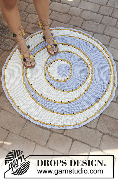 round knit rug in white, light blue and mustard