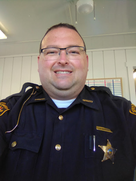 Deputy and special education teacher Adam Holcombe in uniform