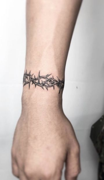 Close view of the wrist barbed wire tattoo