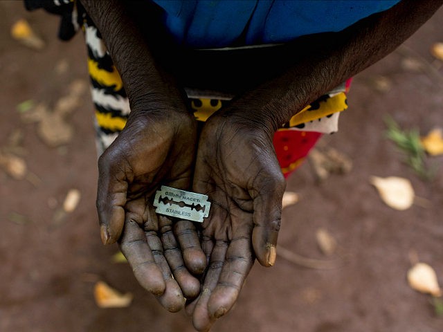 *** EXCLUSIVE *** MOMBASA, KENYA - JUNE 25: Cutter Anna-Moora Ndege shows the razorblade she uses to cut girls' genitals , on June 25, 2015, in Mombasa, Kenya. THESE are the rudimentary tools used to cut young girls sexual organs in remote villages in Kenya. The cruel practice of female genital mutilation (FGM) is illegal in the UK and in dozens of countries in Africa. But in remote Kenyan villages and communities far from the capital, Nairobi, the practice is very much alive and well. PHOTOGRAPH BY Ivan Lieman / Barcroft Media (Photo credit should read Ivan Lieman / Barcroft Media via Getty Images)
