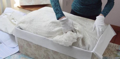 best way to store a wedding dress