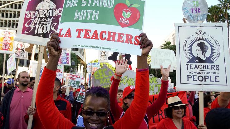 Teachers rally at the #March4Ed march through downtown Los Angeles, Dec. 15, 2018.