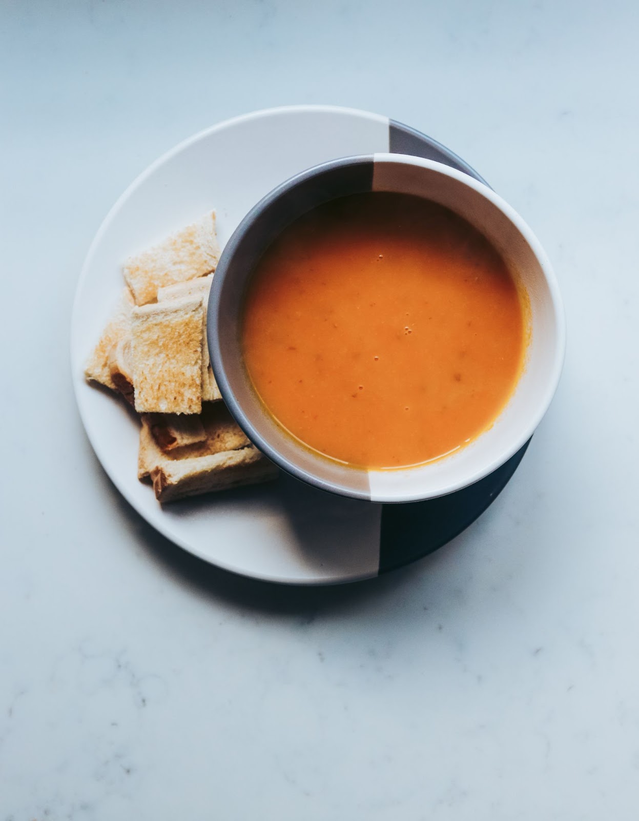 Soup and crackers on a plate