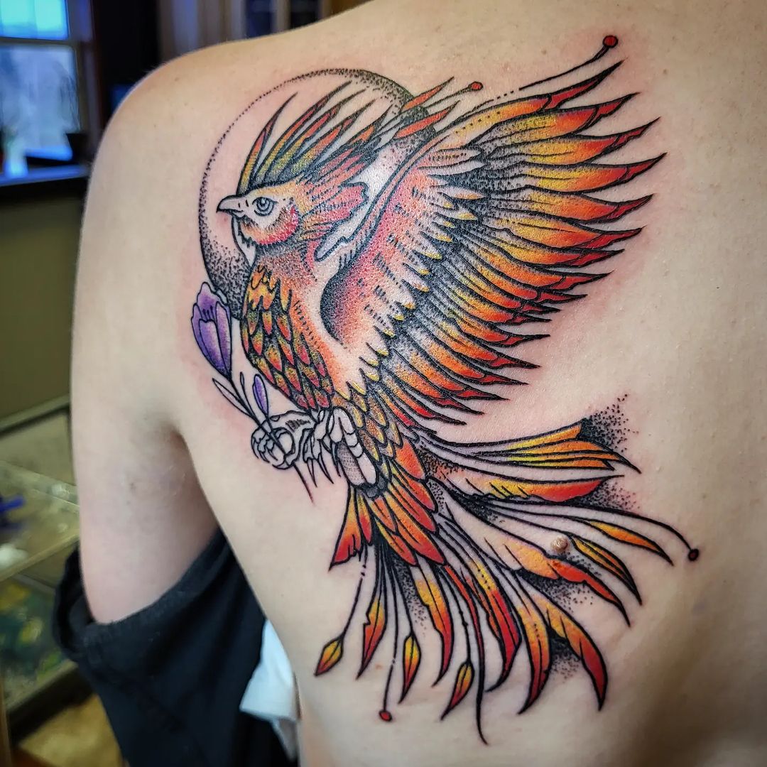 Phoenix Holding Flower Tattoo