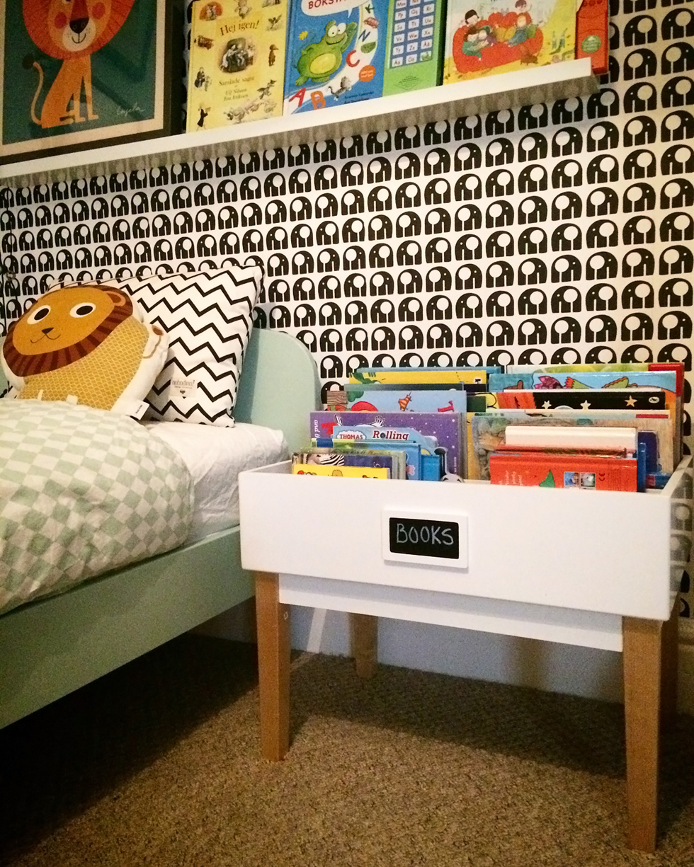 Record organizer used for kids' books in very designed room