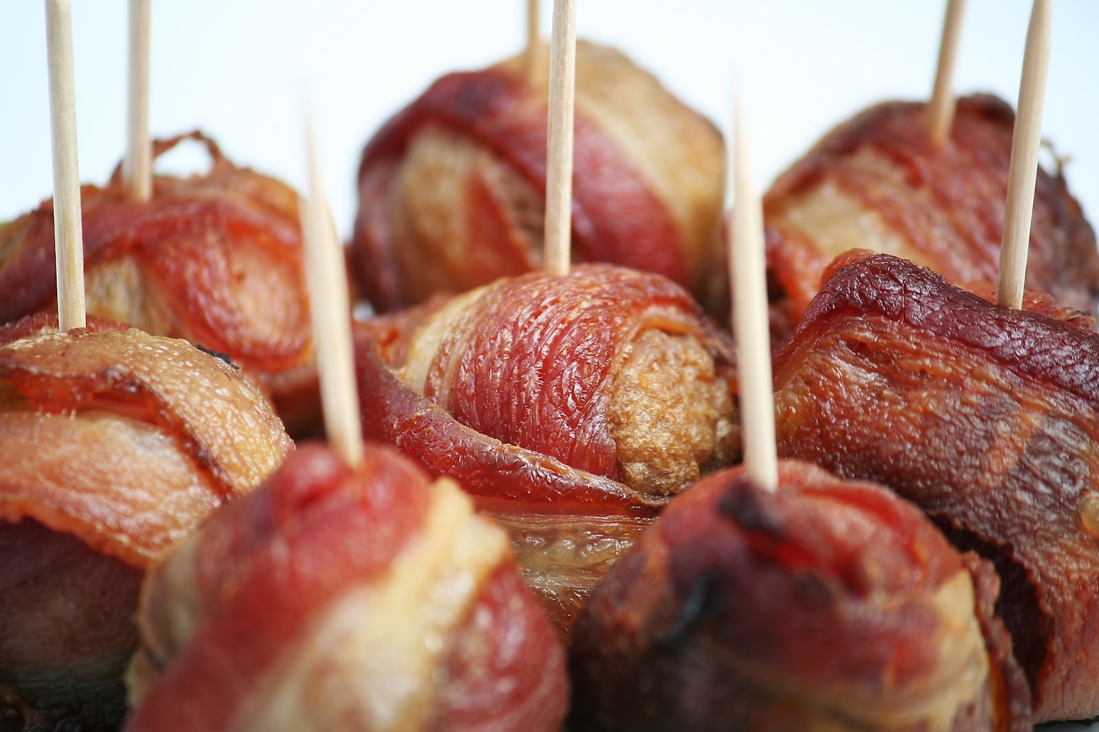 Bacon-wrapped meatballs on toothpicks for an open house.