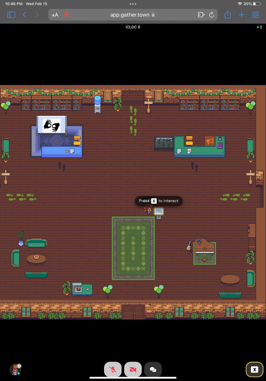 Image of an avatar approaching an interactive object. When you approach an interactive object, you will see the message “Press ‘x’ to interact.” Click on the X at the bottom right of your screen to view the interaction. 
